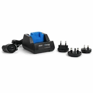 Cargador sobremesa detector Ventis con base negra, inserto azul y adaptadores sobre fondo blanco